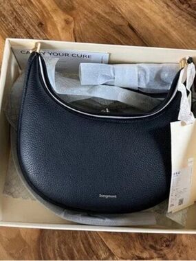 Songmont Black Pebbled Crescent Shoulder Bag